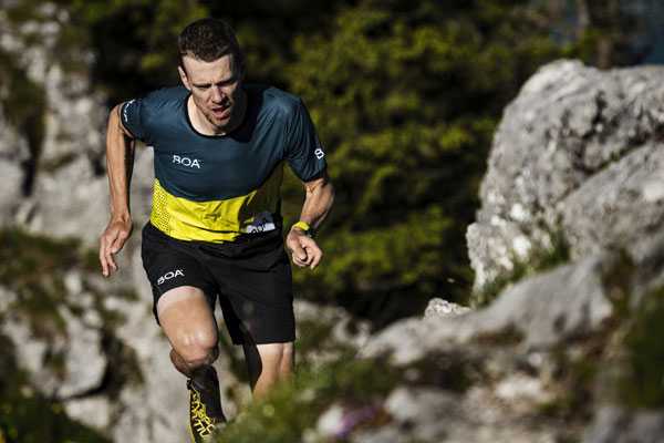 BOA Alps Trail Team runner Philipp Bachl runs up a steep trail